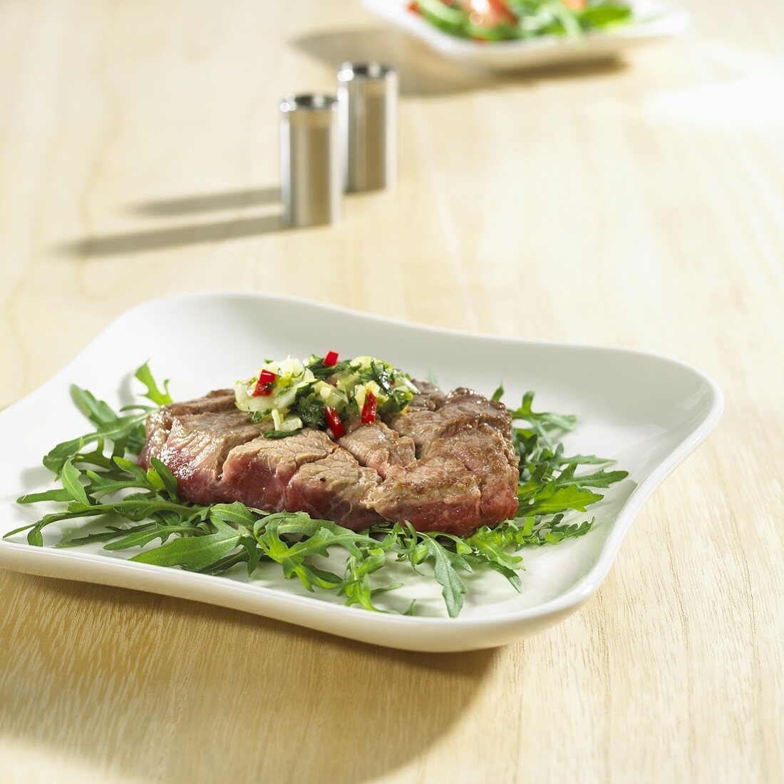 Seared beef fillet with shallots, parsley, rocket