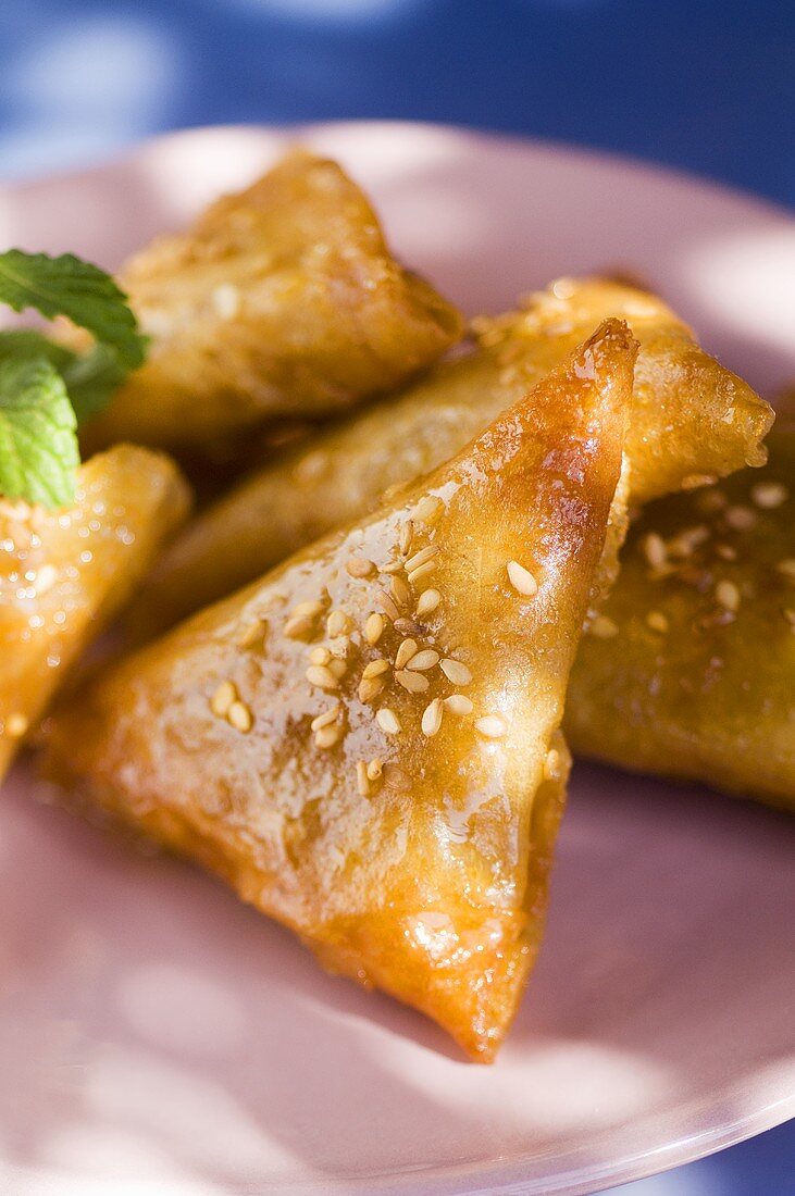 Almond briouats with honey & sesame seeds (pastries, Morocco)