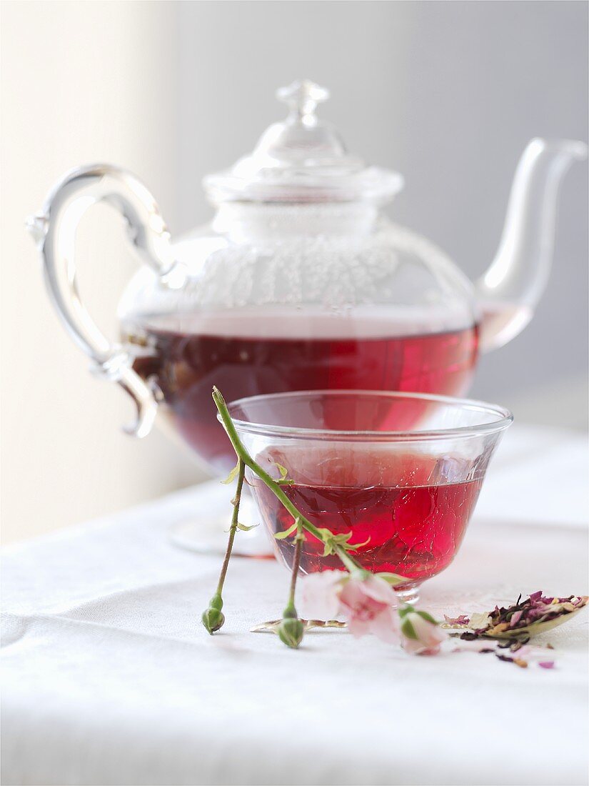 Rose tea in teapot and tea bowl