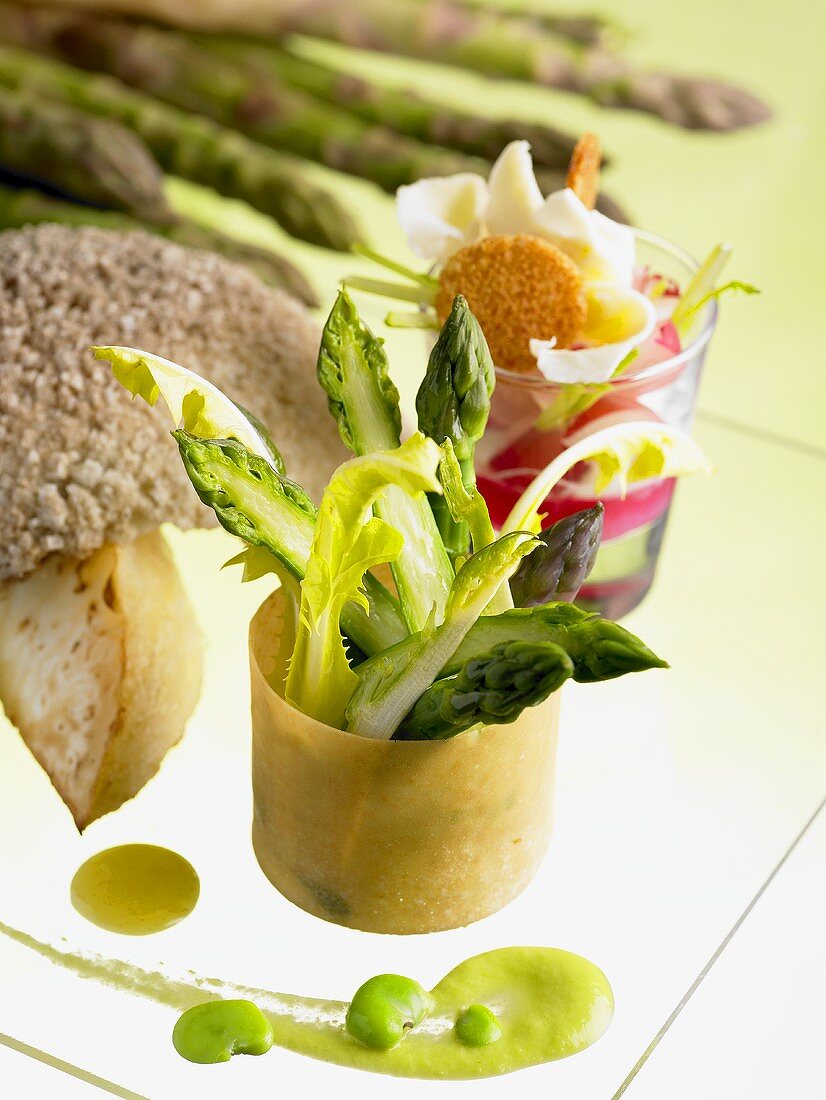 Green asparagus salad with pea puree