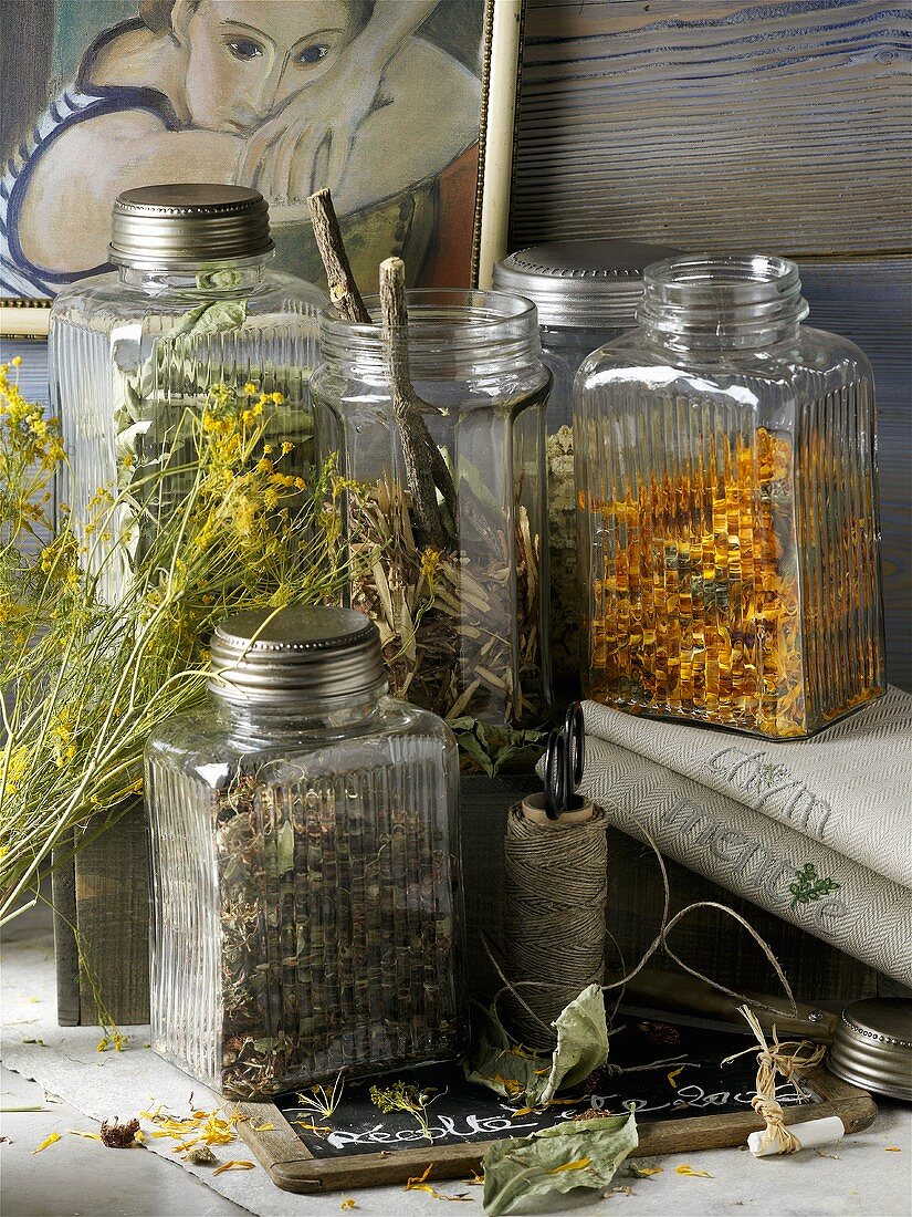 Dried medicinal plants in screw-top jars