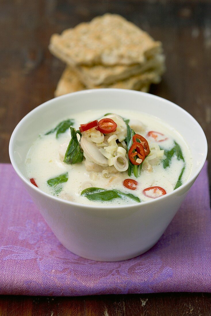 Chicken coconut soup with spinach, lemon grass and chilli