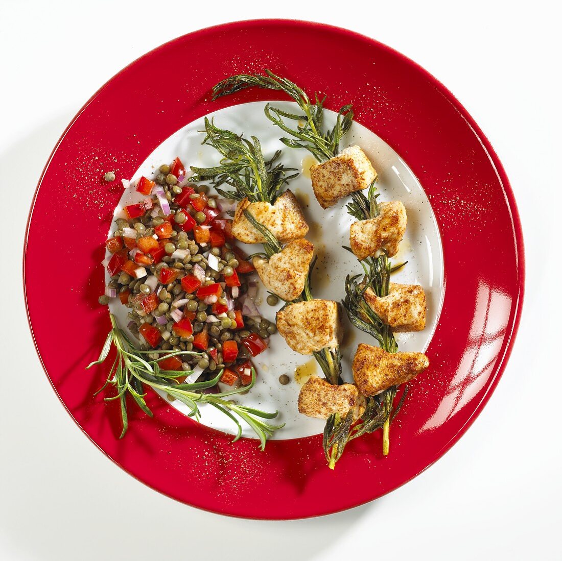 Grilled chicken on rosemary skewers with lentil salad