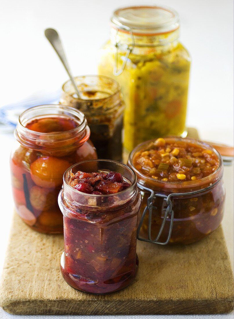 Relishes and pickled vegetables in preserving jars