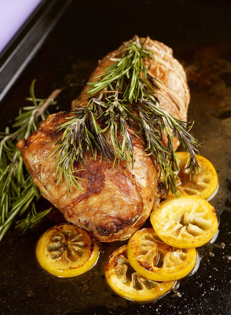 Roast lamb with rosemary and lemons for Easter