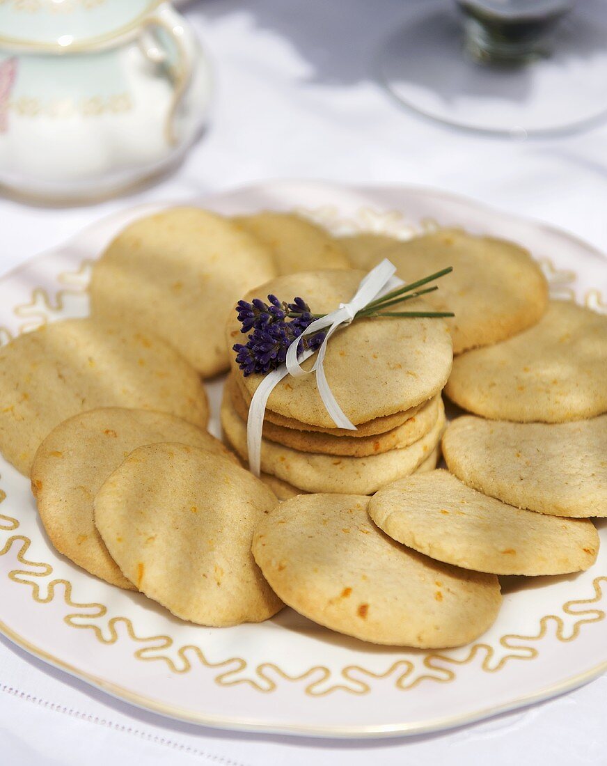 Citrus and cinnamon biscuits with a bunch of lavender