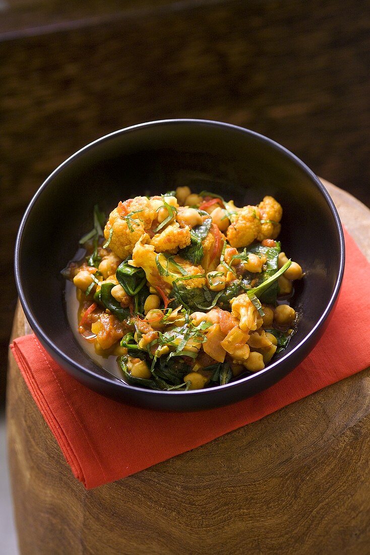 Chick-pea and cauliflower curry with basil