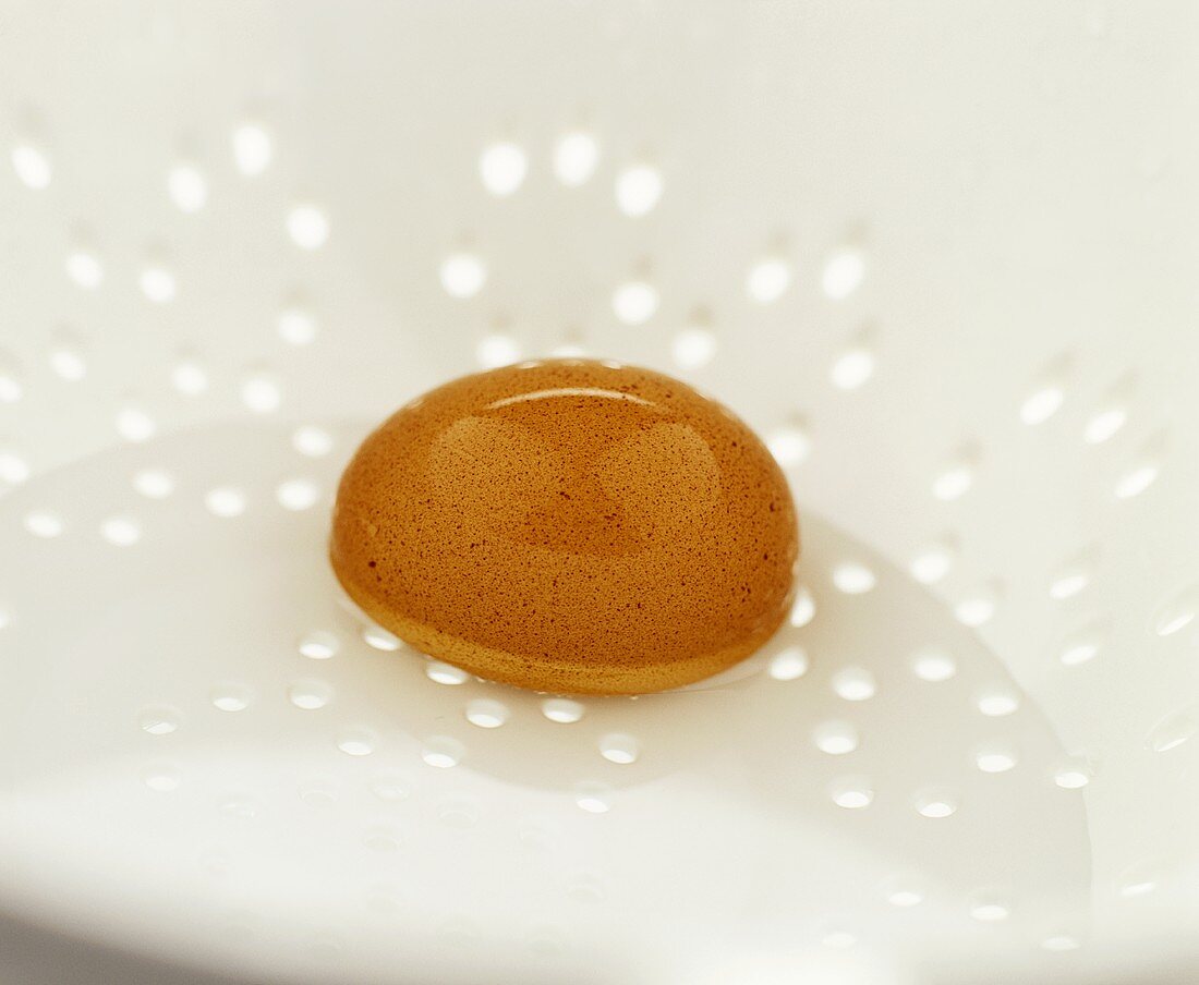 Boiled egg in a colander