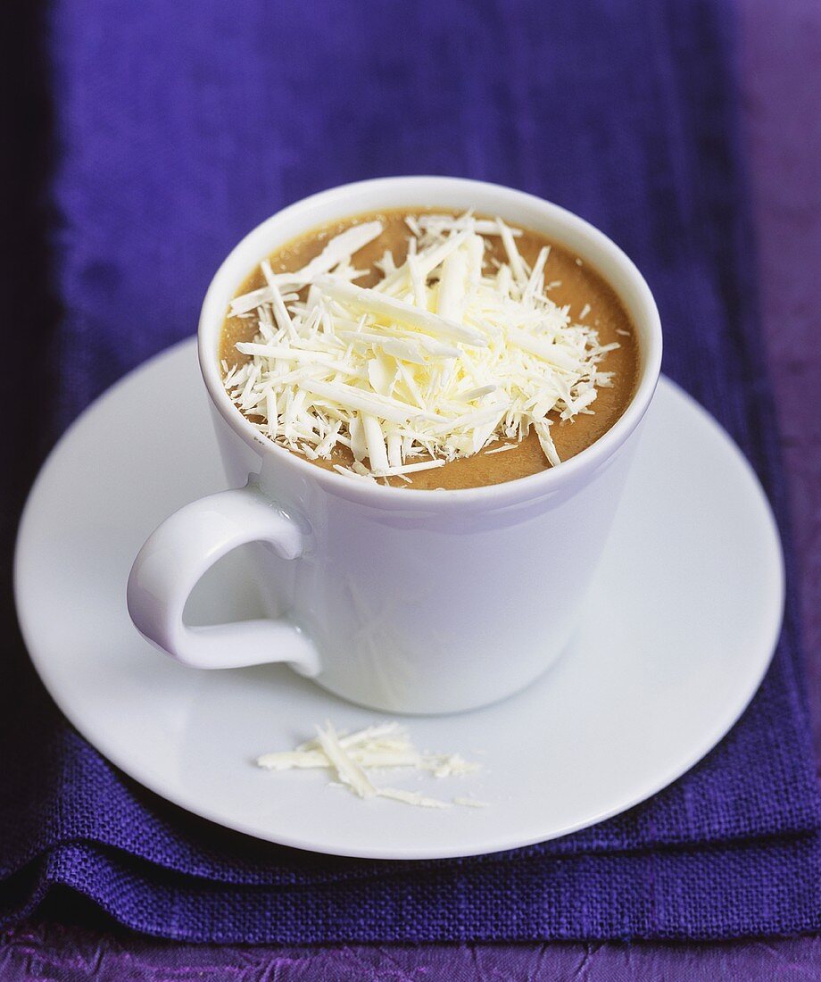 Coffee cream with white chocolate in a cup