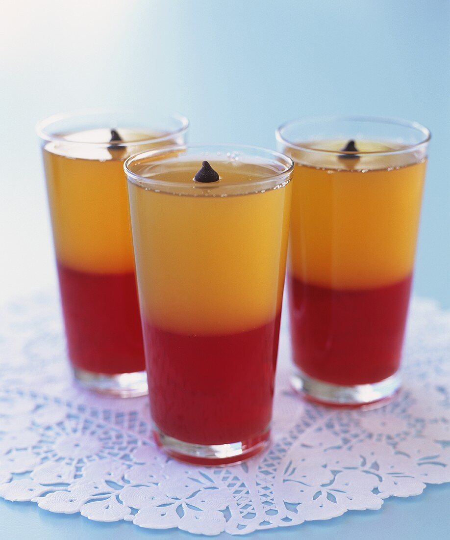 Three glasses of cranberry and honey jelly