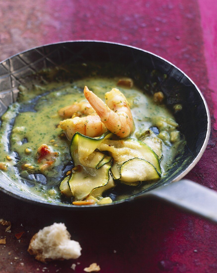 Pan-cooked prawns and courgettes with herb sauce
