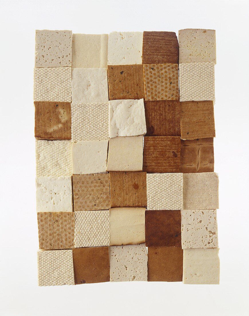 Cubes of various types of tofu arranged in a rectangle