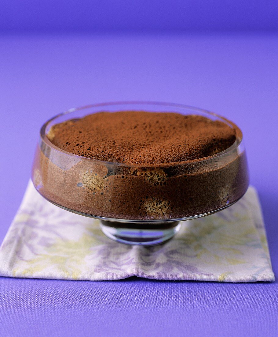 Chocolate tiramisu in a glass dish