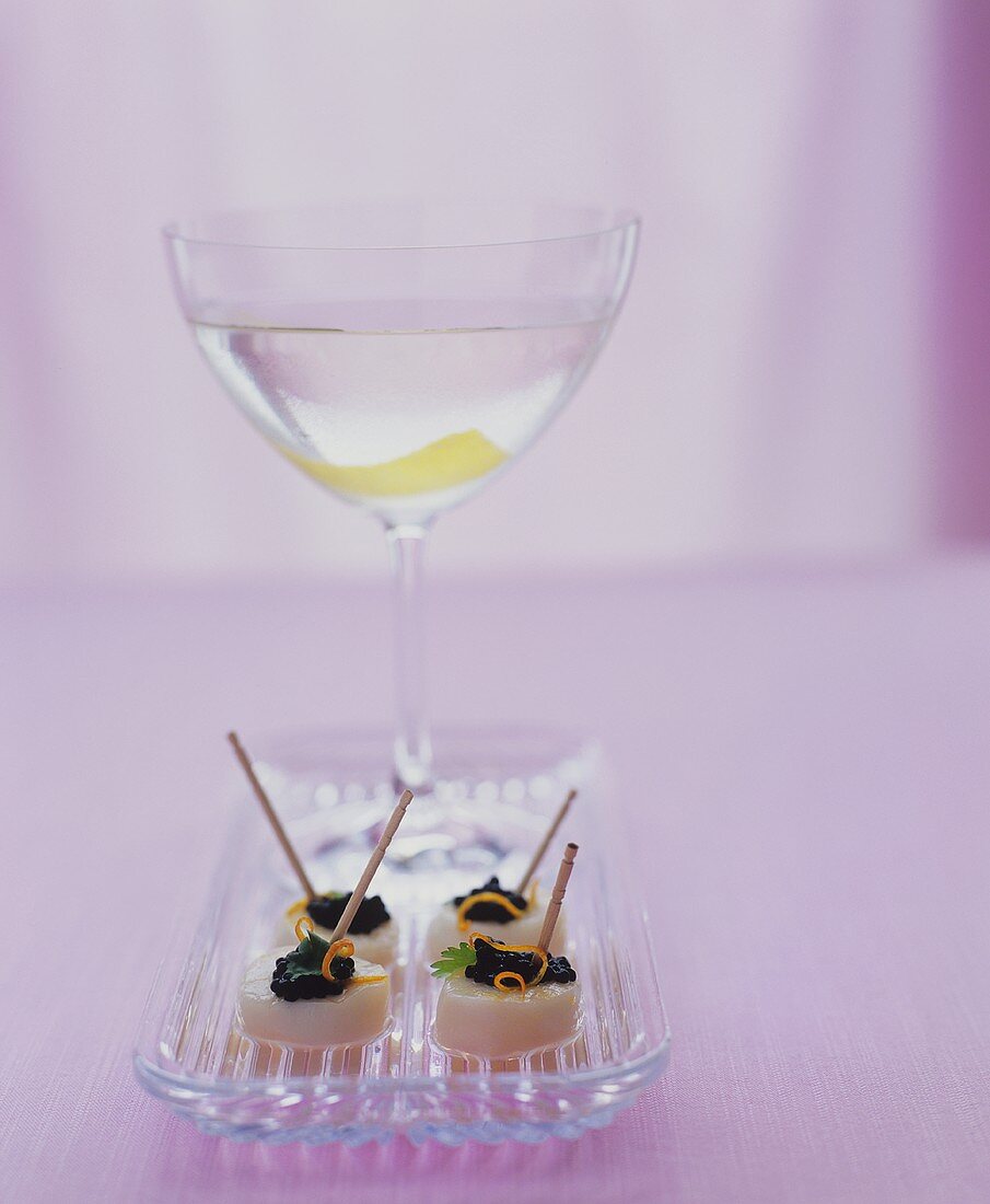 Scallops on cocktail sticks with caviar & orange zest, aperitif