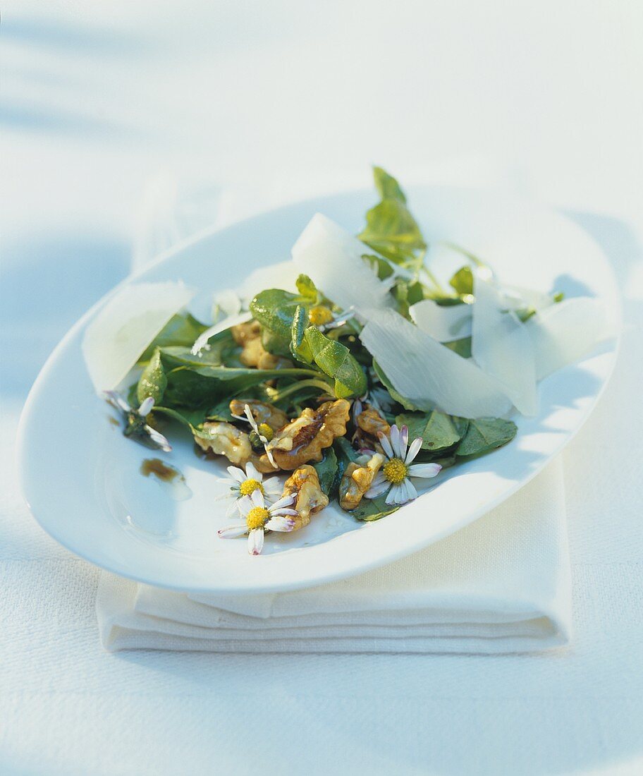 Wild herb salad with daisies, walnuts and goat's cheese