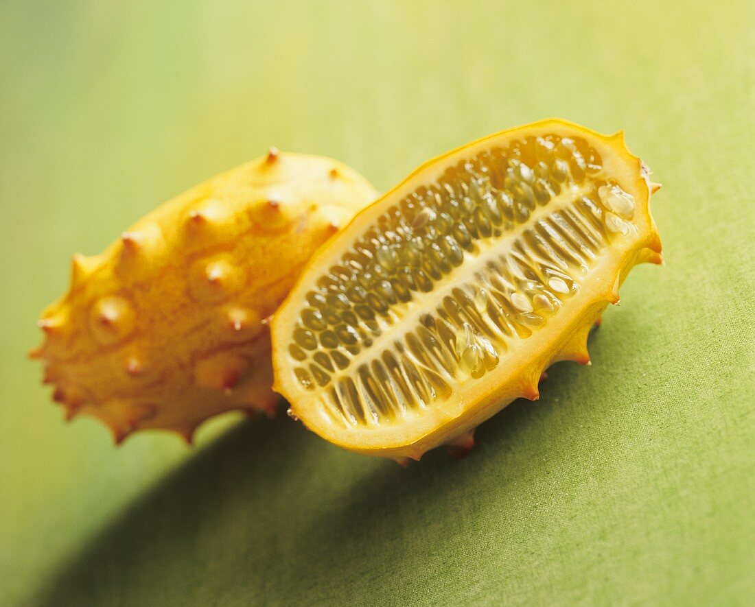 Whole kiwano and half a kiwano (horned melon)