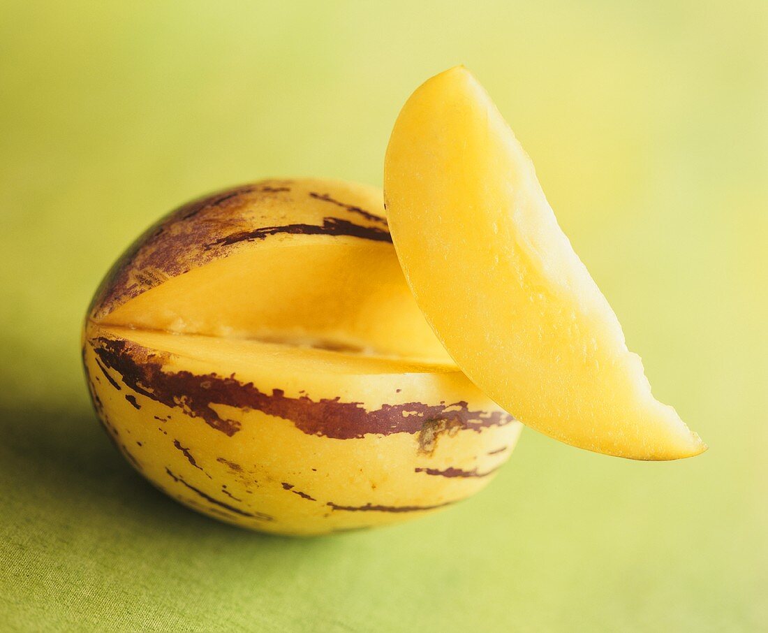 Pepino melon with a section cut out