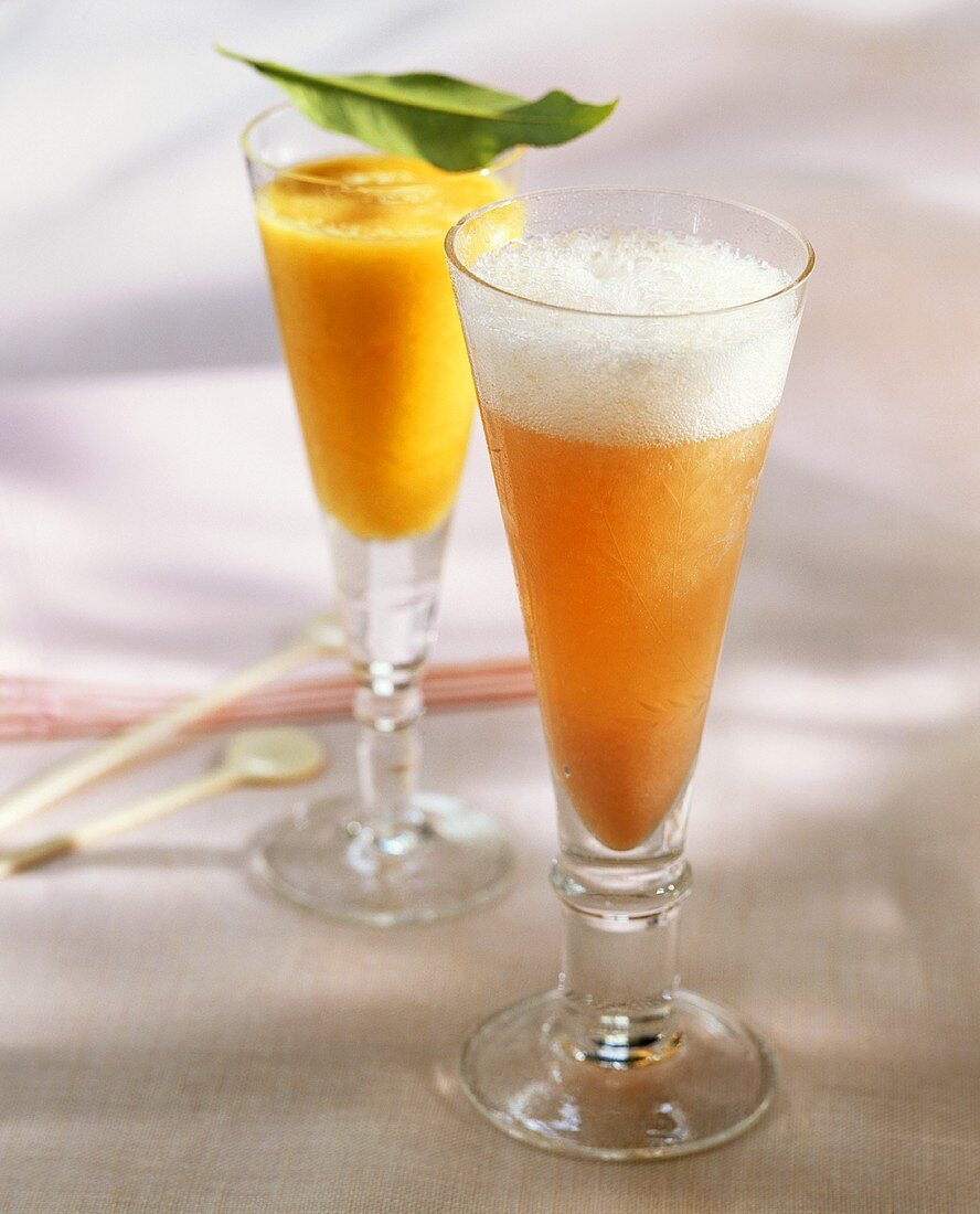 Orange cocktail and grapefruit cocktail with sparkling wine