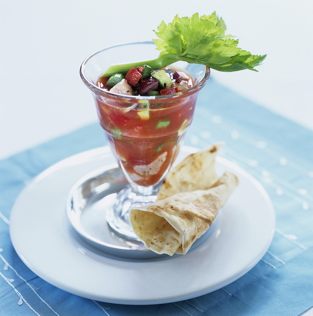 Salmon cocktail in glass with wheat tortilla