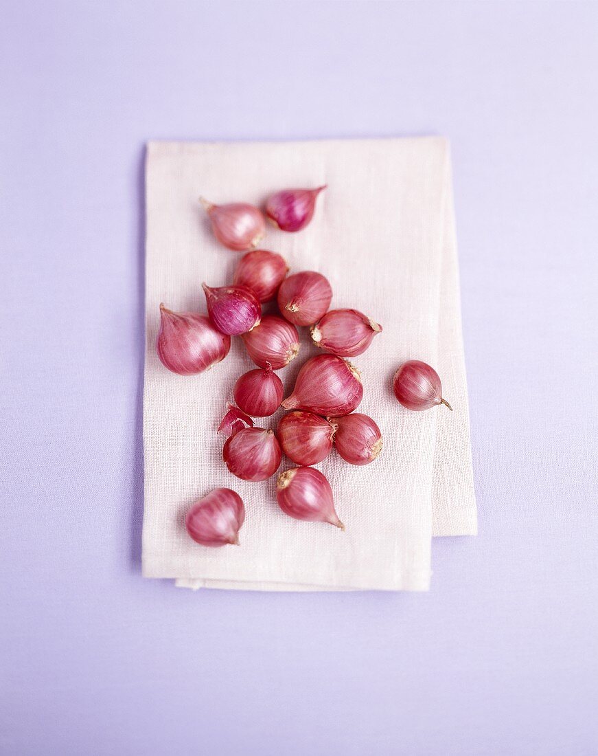 Thai shallots on a linen cloth