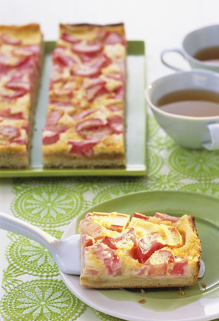Tray-baked rhubarb cake with tea