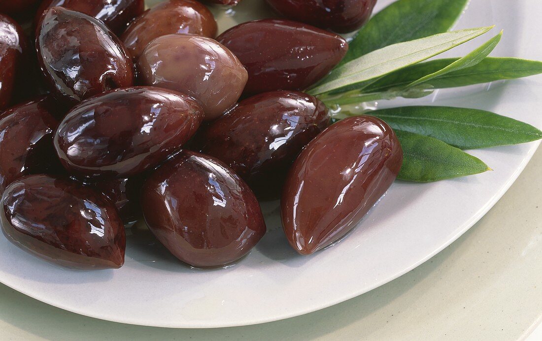 Black olives on a plate