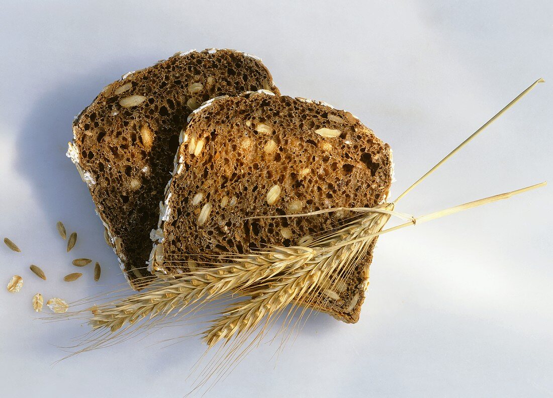 Two slices of wholemeal bread with cereal ears