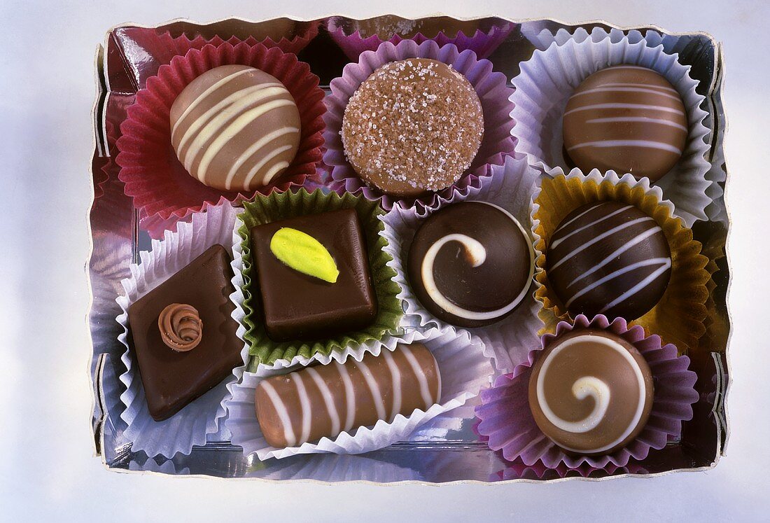 Box of assorted chocolates in paper cases