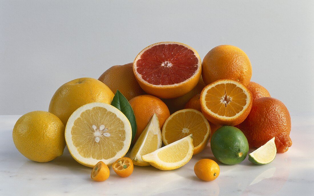 Assorted citrus fruit, whole and pieces