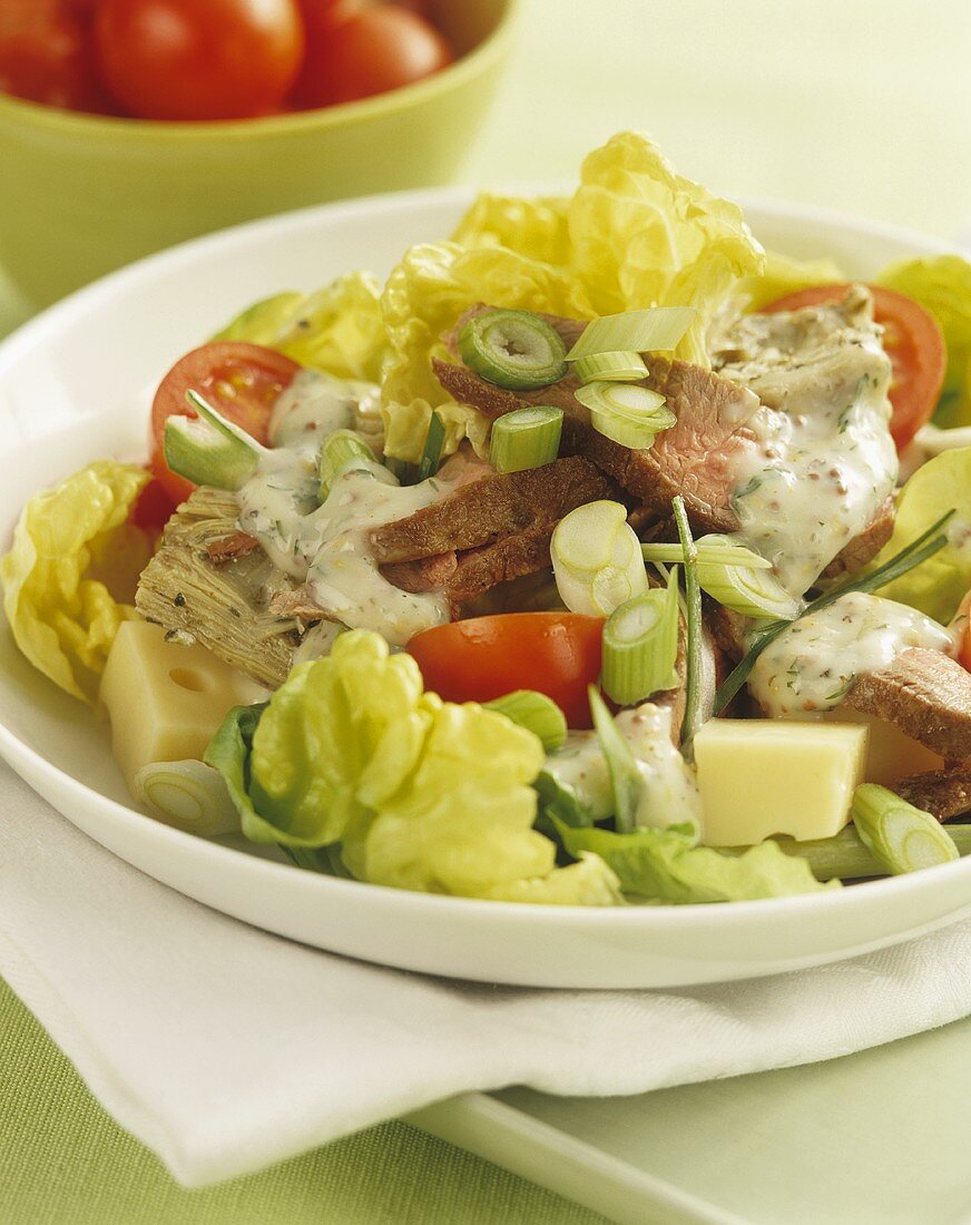 Mixed salad with lamb, mustard dressing