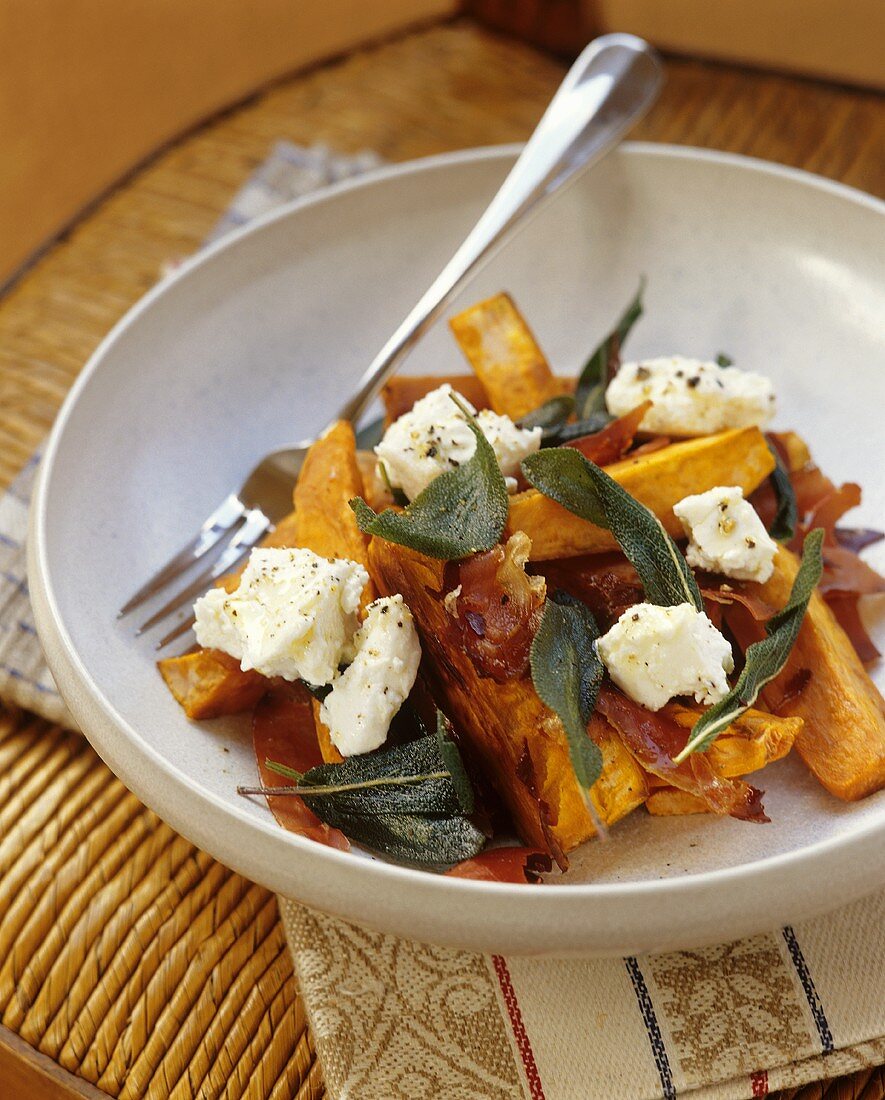 Sweet potato salad with ham, goat's cheese and sage