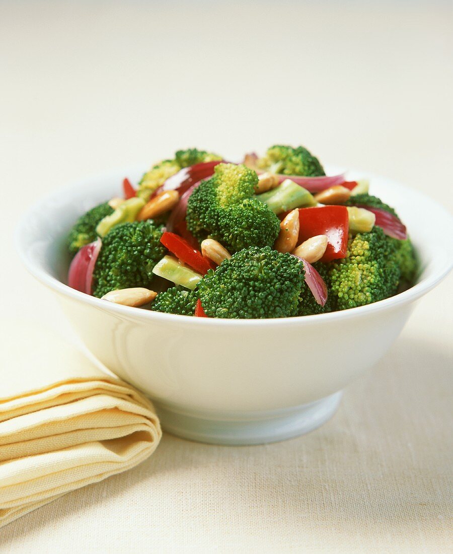 A bowl of broccoli with chilli and almonds