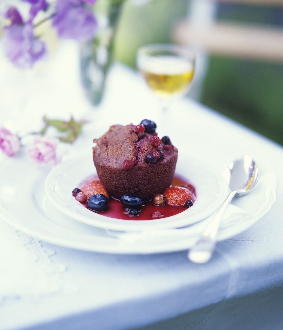 Chocolate muffin with berry compote