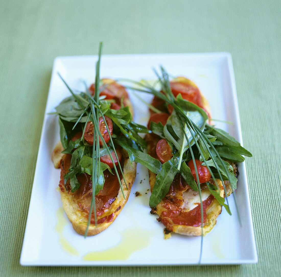 Bruschetta with pancetta, tomatoes and herbs