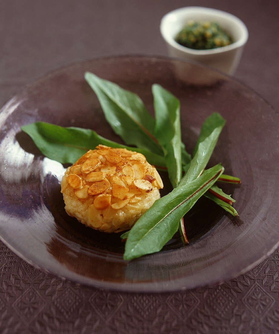 Chicken and almond meatballs with lettuce leaves