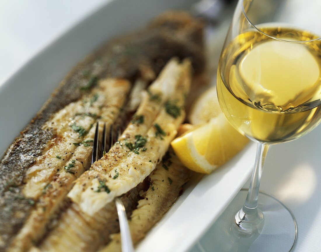 Whole fried plaice with white wine