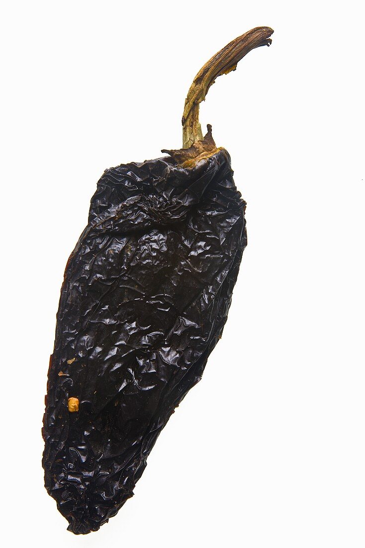 A dried chilli pepper (chile ancho, broad chilli pepper)