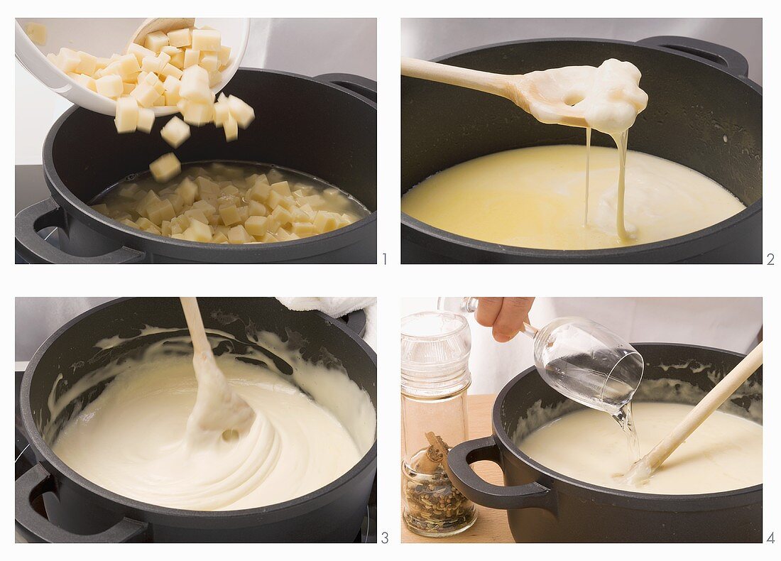 Cheese fondue with Gruyère and Fontina being prepared