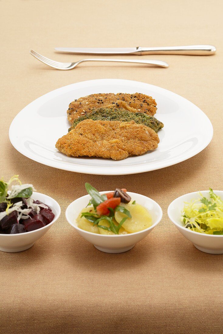 Veal escalope with various salads