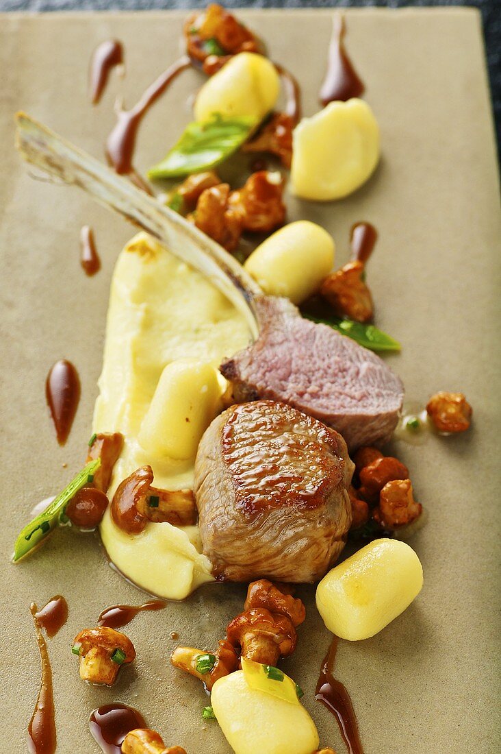 Roasted saddle of lamb with gnocchi, chanterelle mushrooms and mashed potato