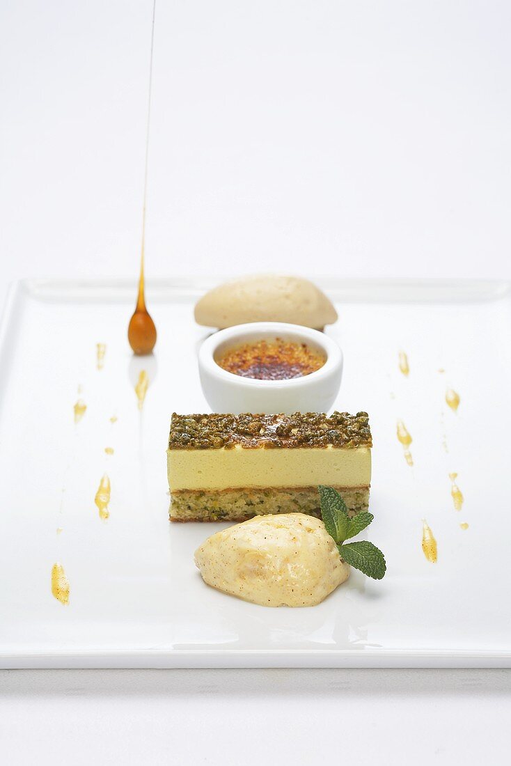 Pistachio dacquoise with almond ice cream and cream brulee
