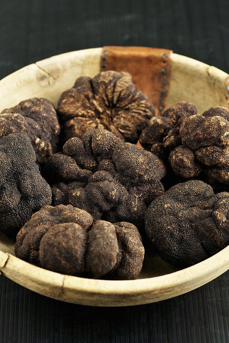 Perigod truffles in a wooden bowl
