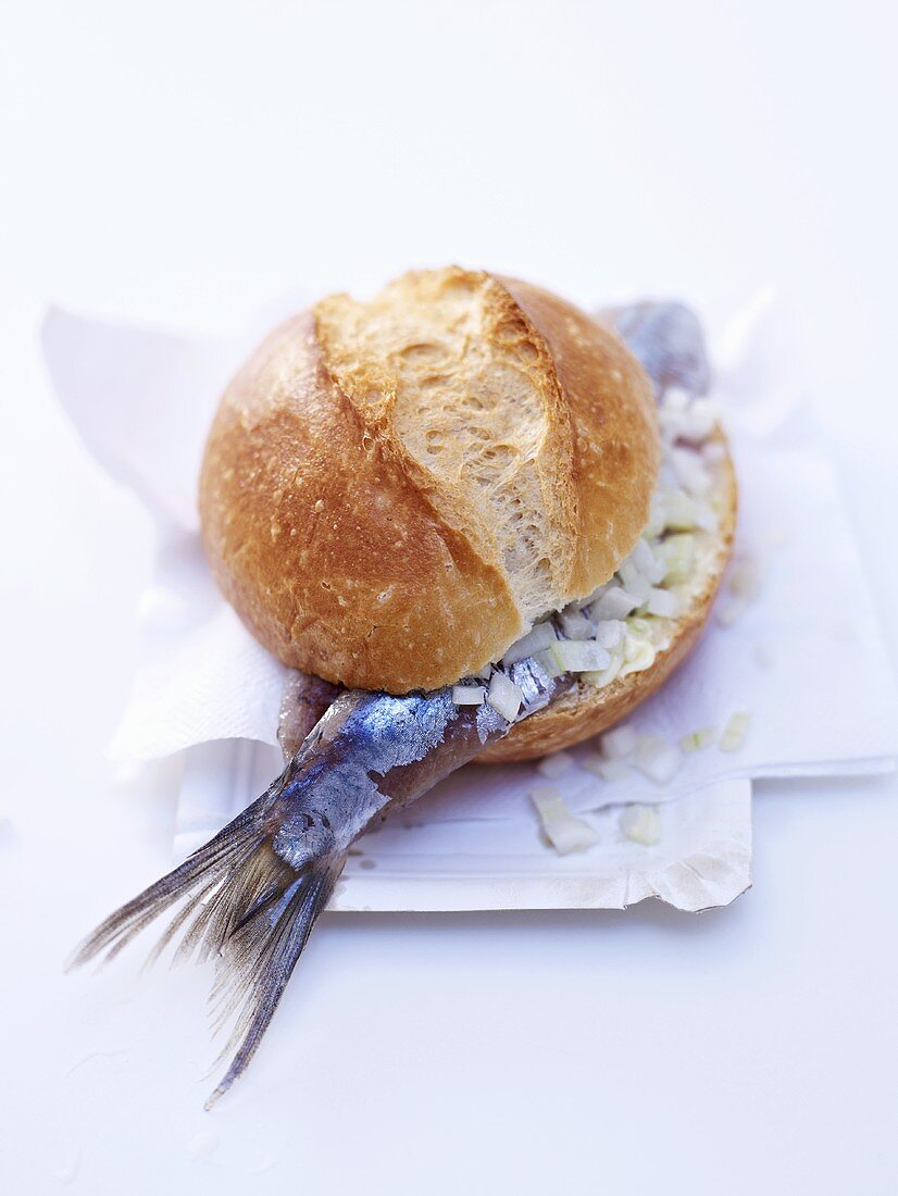 Soused herring roll with onions