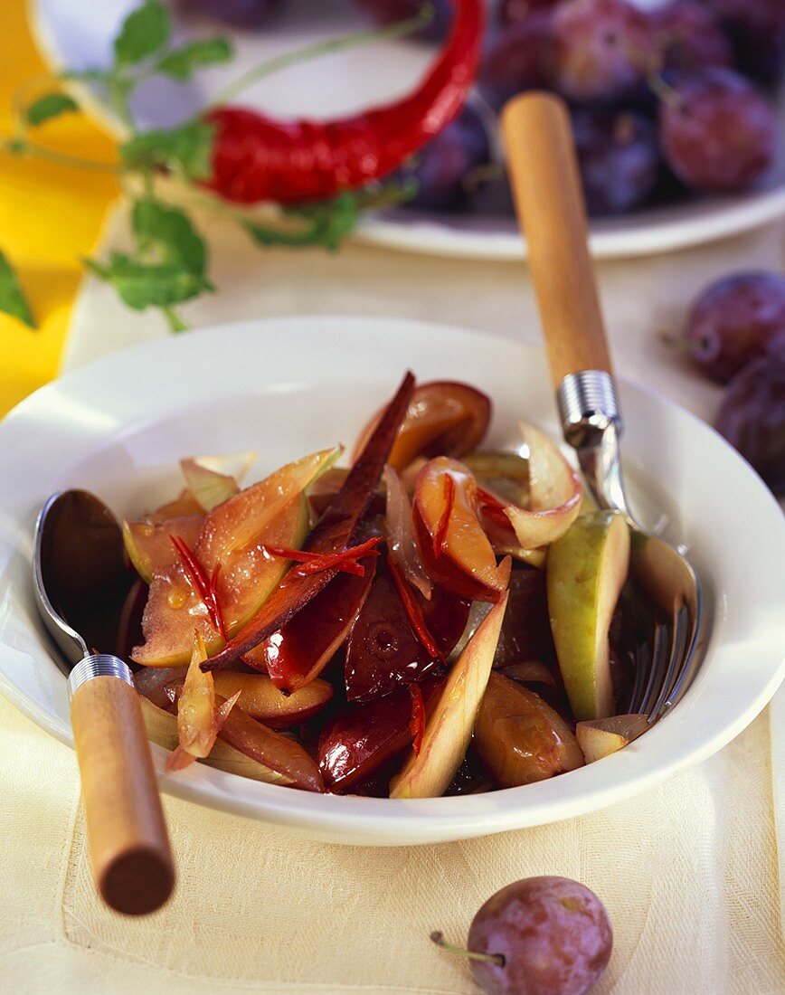 Plum and onion slices with strips of chilli