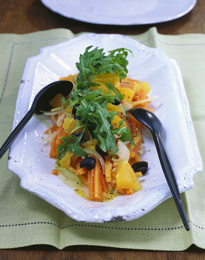 Marinated carrots with oranges, olives and rocket