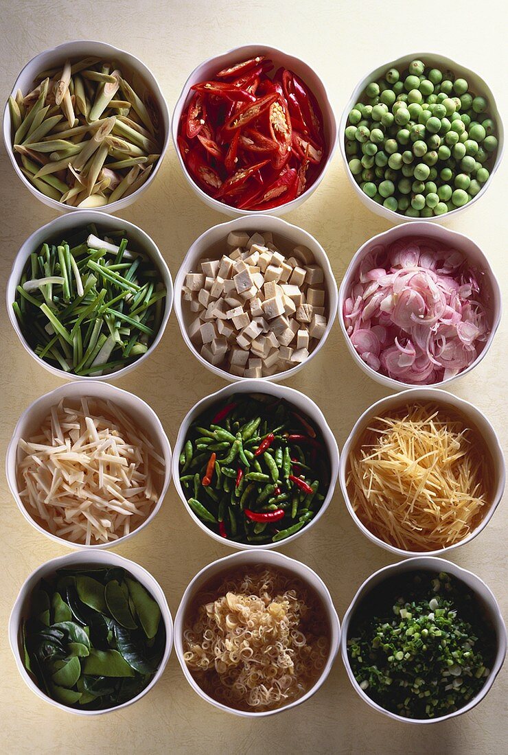 Various ingredients for Asian cuisine in small bowls