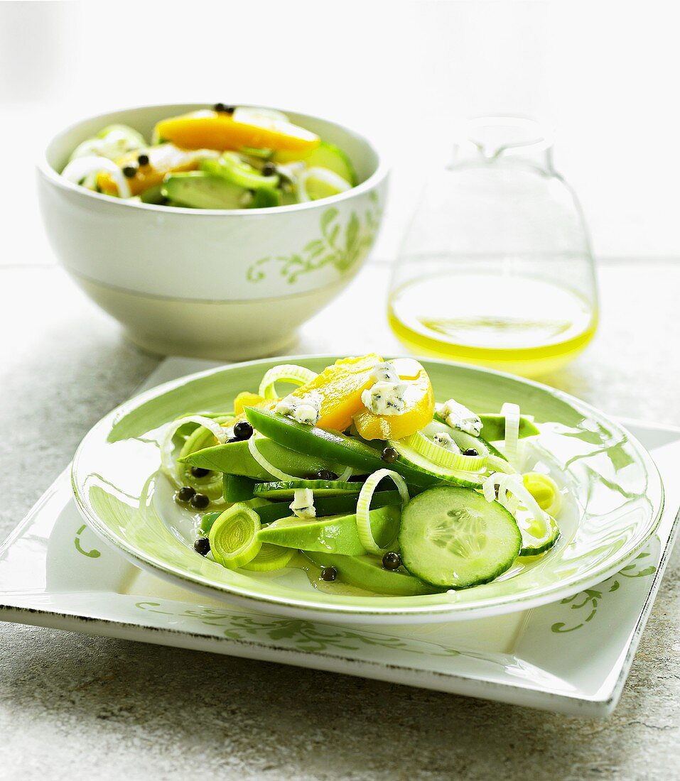 Cucumber and avocado salad with peach and blue cheese