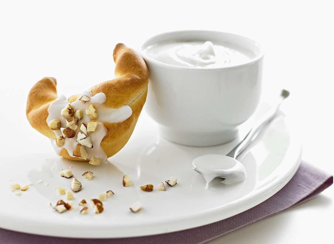 Iced croissant with hazelnuts