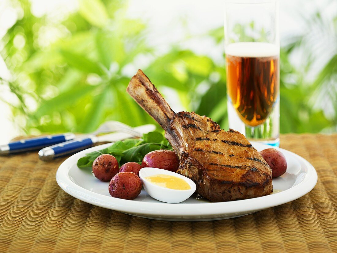 Honey-glazed veal chop with boiled egg and red potatoes