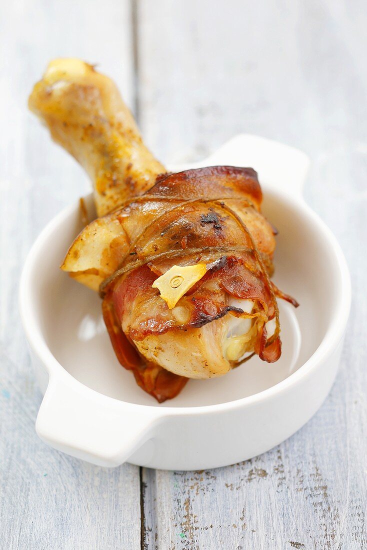 Bacon-wrapped chicken leg